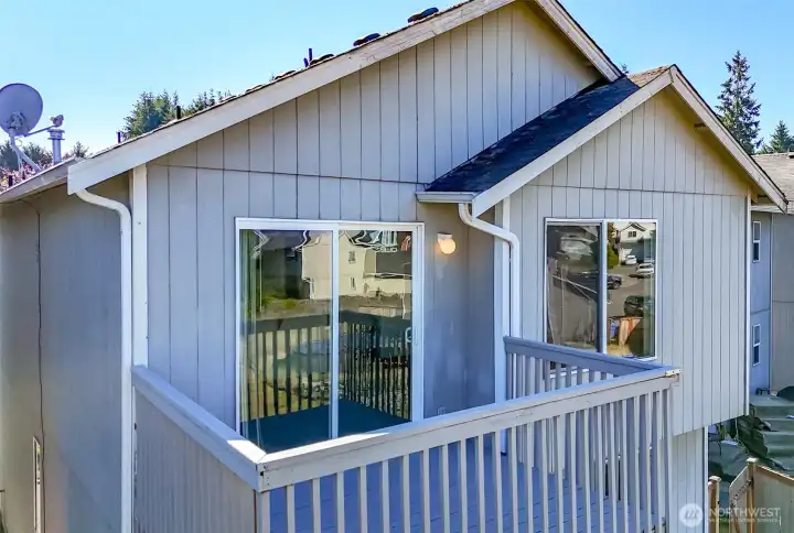 Deck off of dining room. Deck off of dining room.