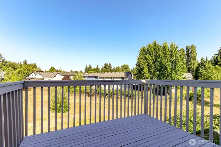 The deck overlooks open space offering additional privacy. The deck overlooks open space offering additional privacy.
