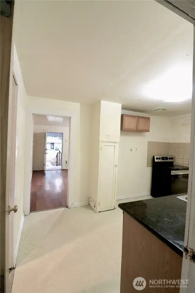View of Kitchen & Living Room from Laundry /Mud Room