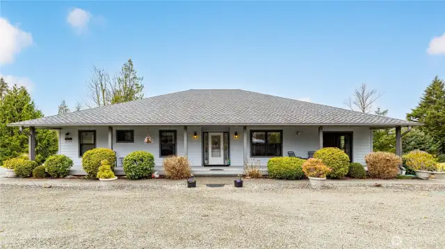 Beautiful custom home with a 50 year Presidential Roof.