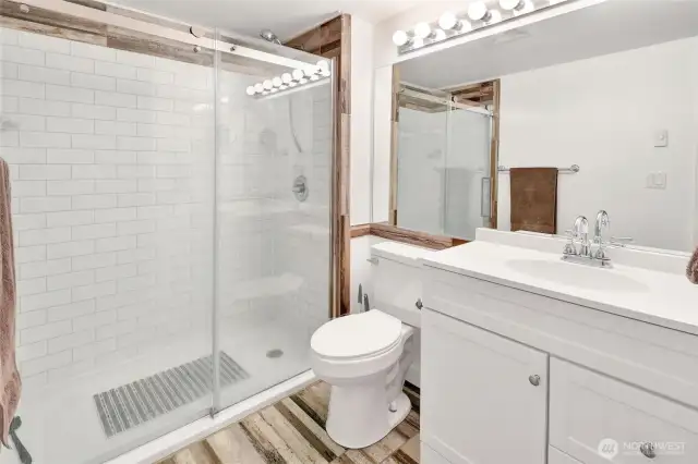 Updated primary Bathroom, walk in shower.