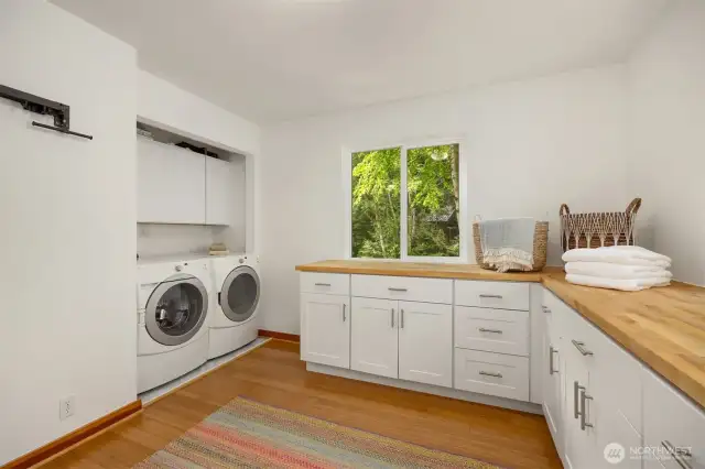 Another view of this large laundry and utility room