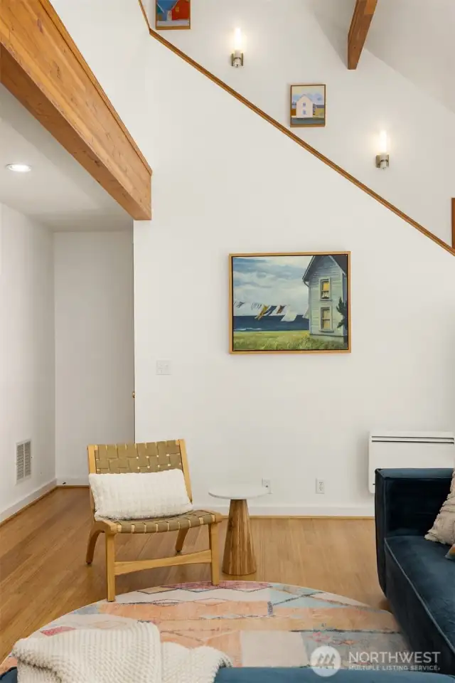This pretty shot of a corner of the living room conceals a staircase leading to another gem of this spectacular home – a sunny walk-out flex room, plus a separate heated workshop and storage space that includes a professional dog bath and a door to the fenced back yard.
