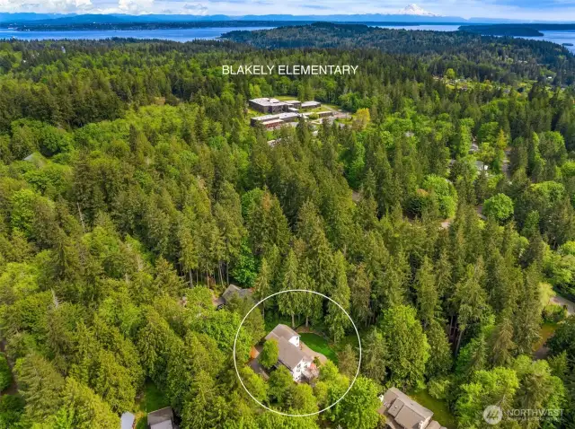 Google tells me that beloved Blakely Elementary is about a 4-minute walk from 8199 NE Mabrey Lane, the route providing wide shoulders and crosswalks for a safe stroll.
