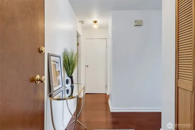 Step in the Condo on a Cherry wood floor.