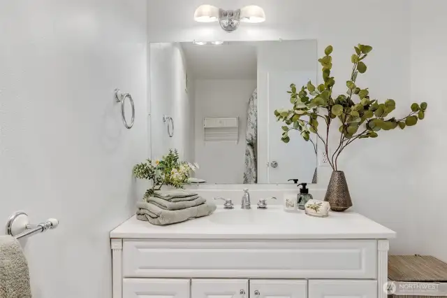 Bright and updated with a full repaint, the bathroom offers a clean, neutral canvas, ideal for everyday comfort.