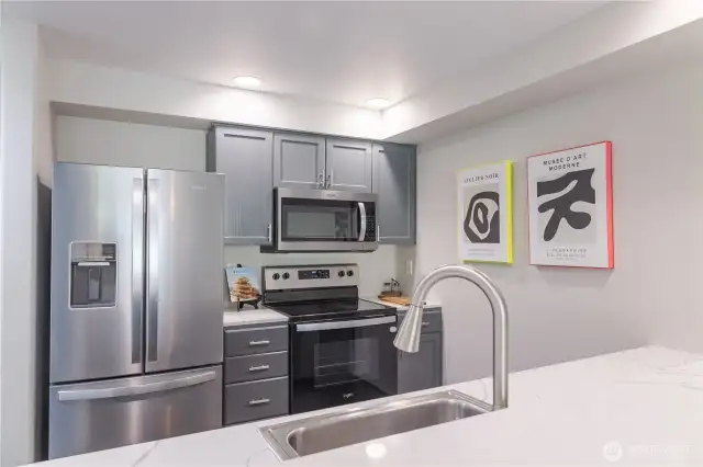 New quartz countertops in kitchen.