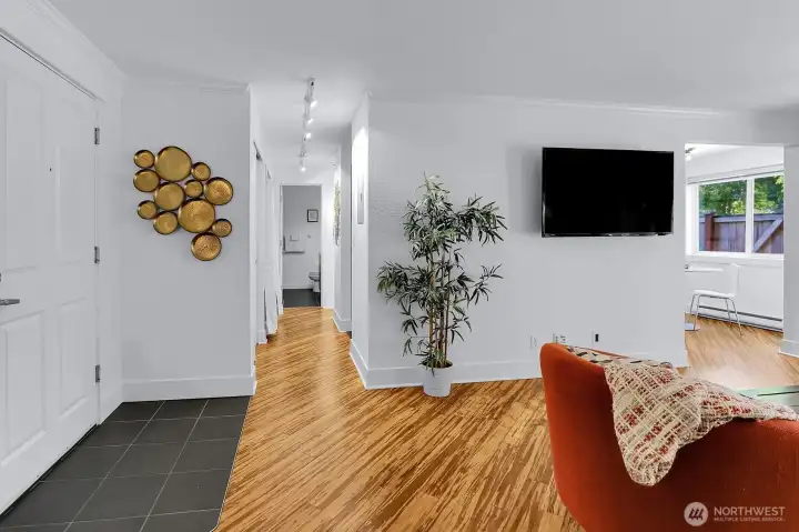 Gorgeous stranded tiger bamboo flooring graces the living and dining areas. You will love the hi-tech elements of this home. Wired for Cat 6, you will have no need for Wi-Fi! There's a smart thermometer for your heating. Living room is wired for surround-sound (wired through the crawlspace). There's 200 amp electric on its own circuit.