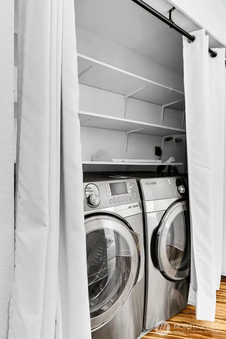 Your in-unit laundry has beautiful Samsung washer and dryer, plus shelving for extra storage.