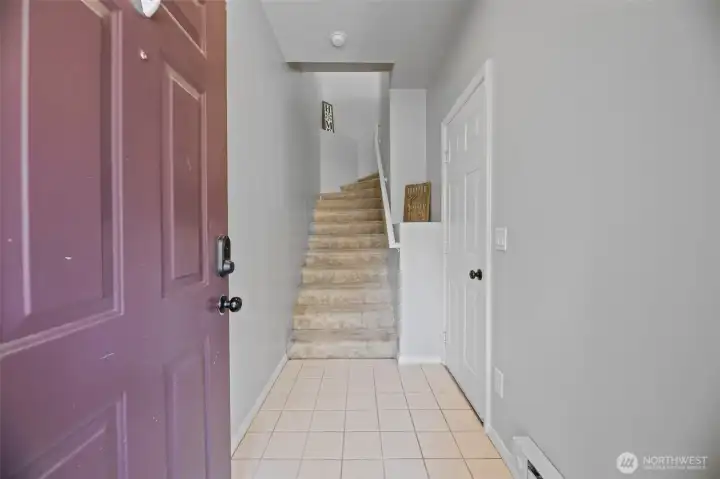Large entry with door to right to access the garage. Notice the cute ledge to display your treasures!