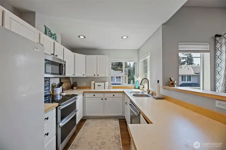 Look how much space this kitchen has! Plenty of counter space for prepping meals.
