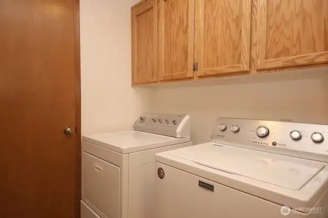 Laundry/mud room leads to the garage.