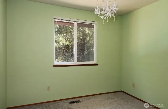 Second bedroom is on your right with new carpet.