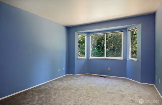 Primary bedroom with new carpet and paint.
