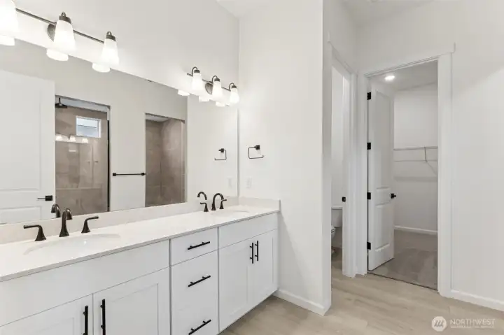 ***Actual Home *** Primary Suite bath, water closet and walk-in closet