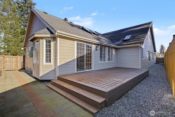 Large composite deck off the great room, perfect for outdoor entertaining and everyday enjoyment, plus a low-maintenance backyard.