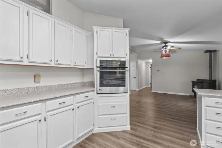 If you can't take the heat (in the Family Room), come back to the kitchen!  That pellet stove gets HOT!  I love that there are so many different spaces to gather, tap your culinary instincts, and unwind!  This manufactured home, lives like a large rambler!  I love that everything is on one level!