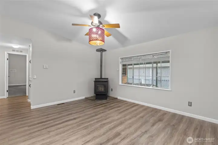 Heatilator Pellet Stove is getting a new Auger Motor that the Seller has already paid for and is scheduled to be installed on March 3rd!  This room is perfect.  A little smaller than the Living Room and away from the front doo, in fact, right by the Laundry Room where you can make a quick escape to a (nearly) fully enclosed cedar deck!  This Family Room is absolutely the coziest room in the home.