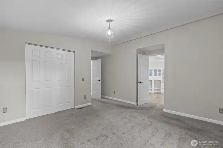 Since the Primary BR and En-Suite take up the entire back part of the home, the windows in the Bath, get the light from the north and the east.