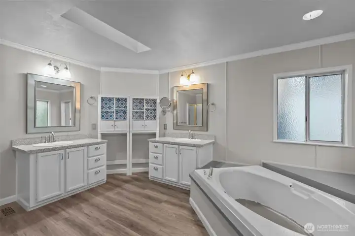 Vaulted Ceiling and a skylight to keep it well-lit with natural light.