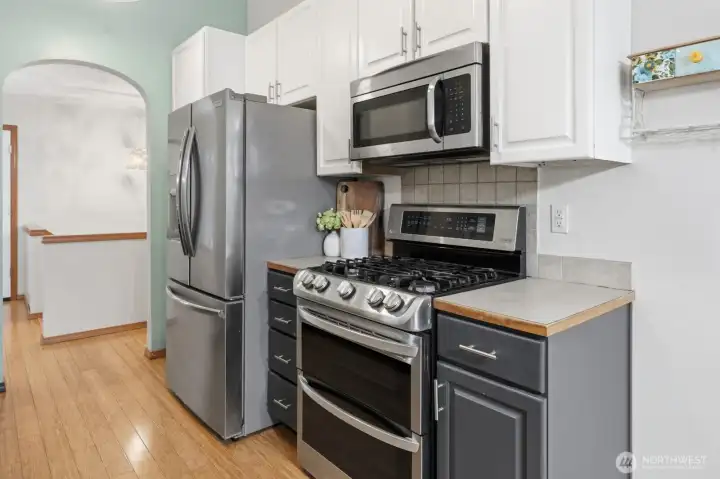 Stainless steel appliances remain with the home, adding both style and convenience to the kitchen.