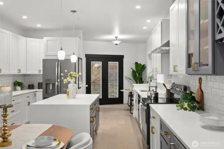 Charming French doors create seamless access to the backyard for grilling and gatherings, while a spacious walk-in pantry sits conveniently to the left