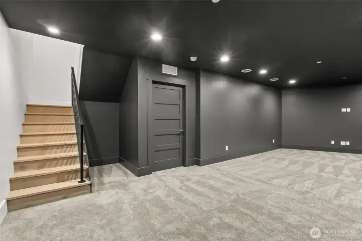 Generously sized bonus room downstairs ideal for movie nights, gaming, or multi-purpose fun!