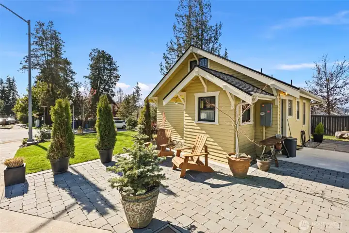 The driveway has been refurbished with lovely Roman pavers and can also act as a patio.