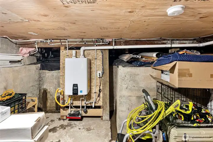 The crawl space is easily accessible from outside and is where many of the new systems are housed.