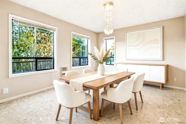 Dining room on Main level. Virtually Staged.