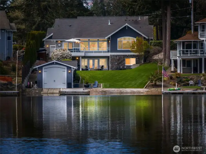 And then there’s this moment. Twilight from the water, with the home glowing back at you, warm light spilling through the windows, calm lake, everything just feels… right. The driveway side of this home faces west, so you’ll catch those golden evening moments across the backyard with Mt. Rainier views and while the home itself offers pockets of shade to keep things comfortable as the sun sets out front. It’s peaceful without being boring, inviting without trying too hard. Located in the North Thurston Public Schools, students here attend Woodland Elementary, Komachin Middle, and Timberline High. There’s also the option for Aspire Middle School, a lottery-based program with a strong focus on visual and performing arts, giving students a creative path that’s pretty special to have access to.