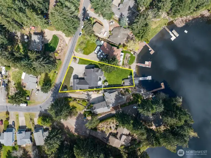 This aerial makes the lot design make sense. Wider at the top for access, parking, and breathing room, then tapering down to a clean 53 feet of waterfront, it’s intentional and efficient in all the right ways. You’re getting usable space where it matters and a direct connection to the lake. Location-wise, you’re not sacrificing convenience either, just minutes to Hawks Prairie, everyday shopping, and easy I-5 access for commuting to JBLM or heading into Olympia for everything from dinner to weekend events.
