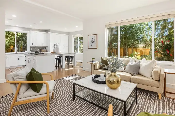 Grand living space showcasing refinished hardwood floors