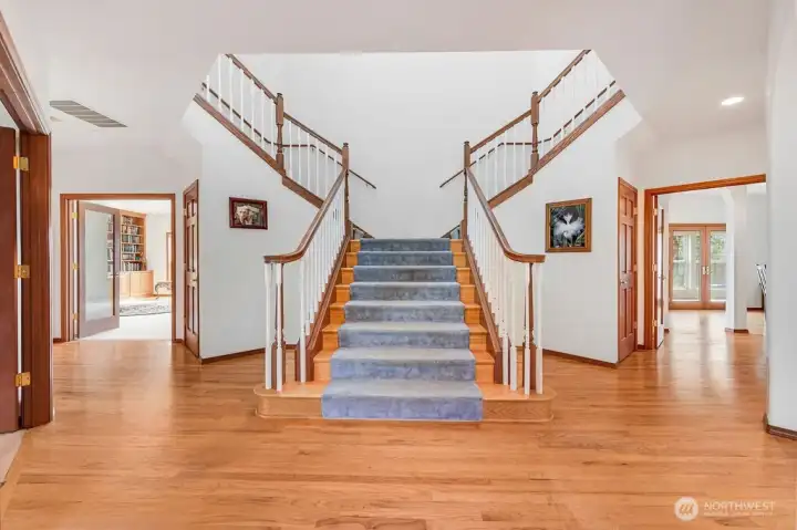 Main entry with staircase to upper level.