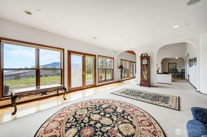 Open floor plan with a wall of window that fill the home with natural light.