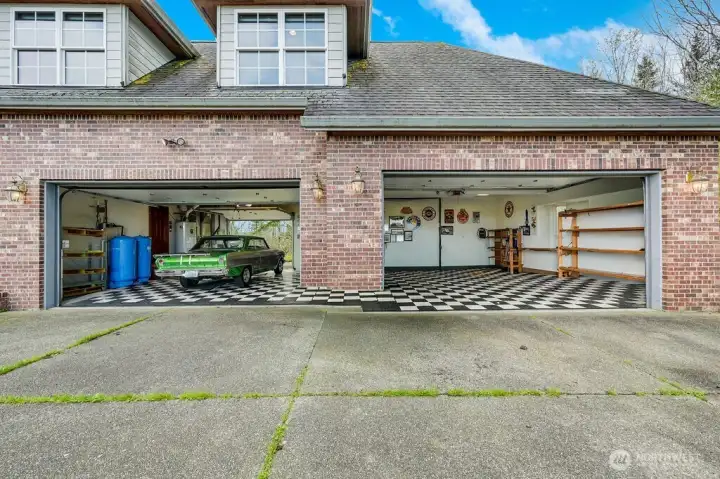 Access into home from the attached 3+ car garage.  3rd rollup garage door leading to back yard.