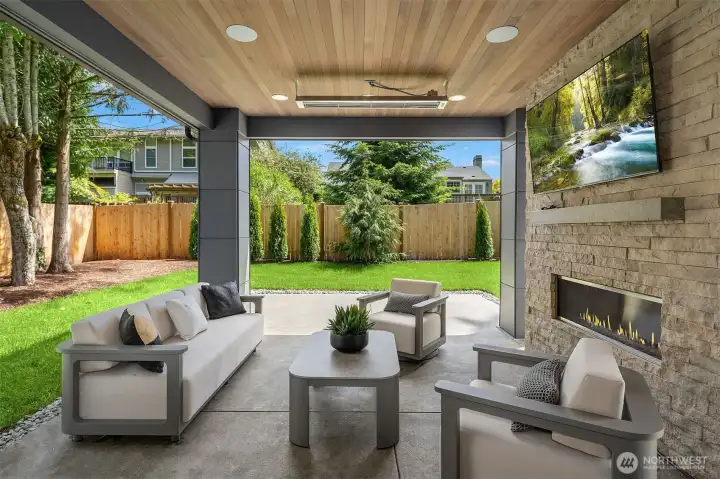 Outdoor covered living area with fireplace