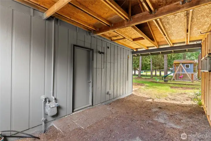 Entrance to covered side yard fom garage.