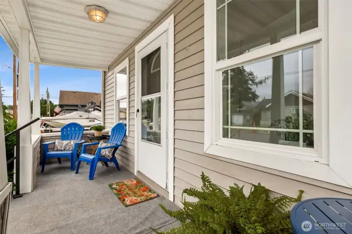 Enjoy morning coffee or afternoon refreshments from the comfort of your welcoming front porch, which sets the tone with timeless charm. Enjoy morning coffee or afternoon refreshments from the comfort of your welcoming front porch, which sets the tone with timeless charm.