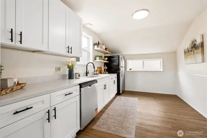 New cabinetry and clean, modern surfaces make meal prep a joy. The thoughtful layout supports everyday living and entertaining. A cozy spot for a small kitchen bistro table or breakfast nook, perfect for casual meals or morning coffee. New cabinetry and clean, modern surfaces make meal prep a joy. The thoughtful layout supports everyday living and entertaining. A cozy spot for a small kitchen bistro table or breakfast nook, perfect for casual meals or morning coffee.