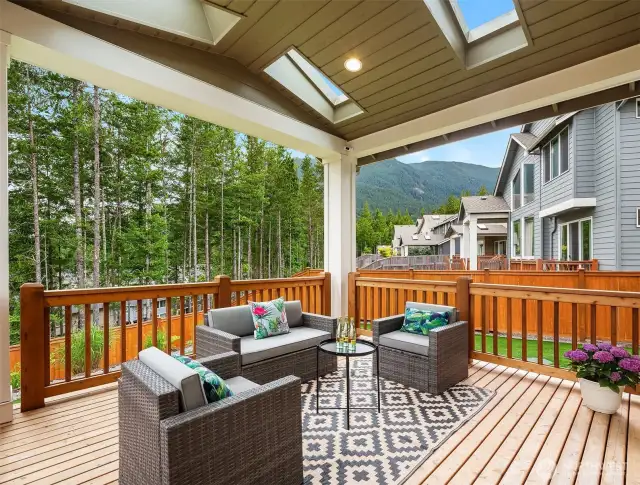 Fully covered outdoor deck with mountain views