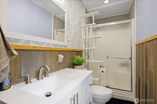 There is a 3/4 bath upstairs with a newer vanity and toilet.