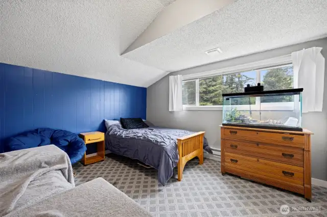 This bedroom overlooks the front lawn and is also quite large.
