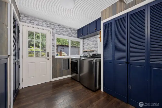 The back porch/laundry room has an abundance of storage and is just off the kitchen.