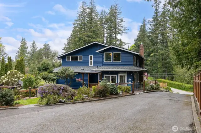 There is an abundance of parking and plenty of room to turn around in the driveway. The landscape and walkways are very inviting!