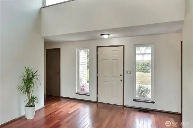 Tons of Natual light. and Stunning Cherry Floors