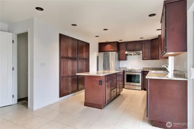Updated kitchen with Granite, stainless appliances and TONS of storage !