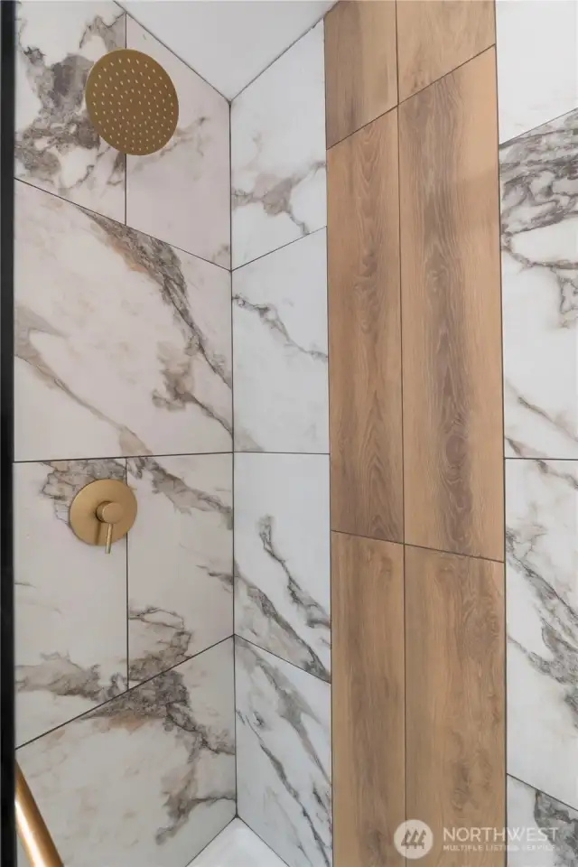 Look at the beautiful shower design. So many thoughtful details in this home!