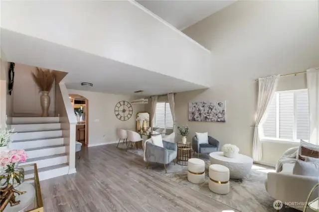 Vaulted ceilings greet you as you walk into your home and this decadent space.