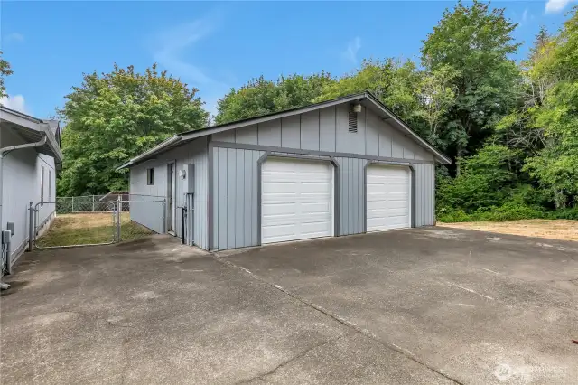 2 car detached garage with shop space. New garage doors just installed